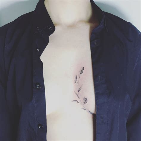 In Between Chest Tattoo Female